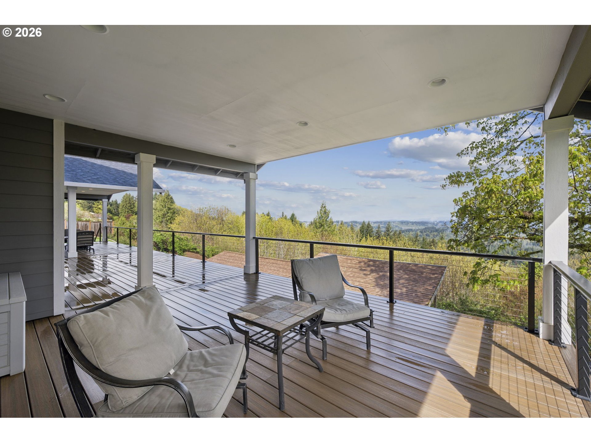 18255 Southeast Vista View Court Sandy, OR 97055 - Photo 20 of 48 a balcony with furniture and view of lake