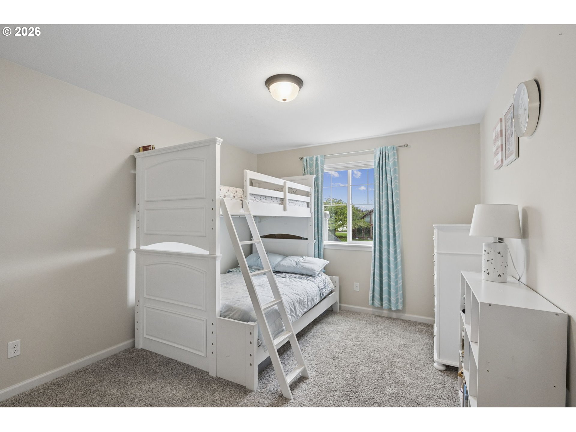 18255 Southeast Vista View Court Sandy, OR 97055 - Photo 27 of 48 a bedroom with a bed and a window