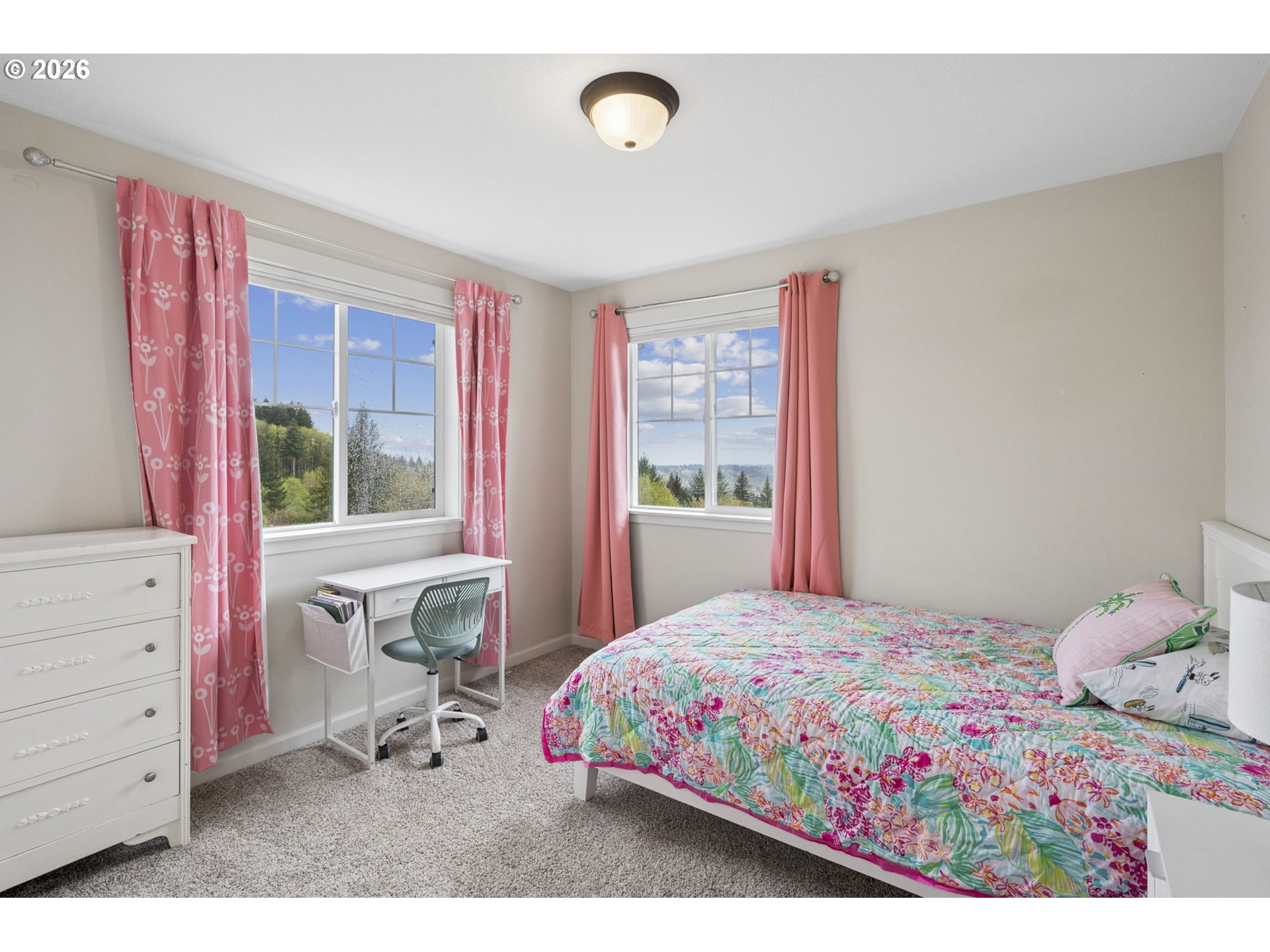 18255 Southeast Vista View Court Sandy, OR 97055 - Photo 28 of 48 a bedroom with a bed and a table