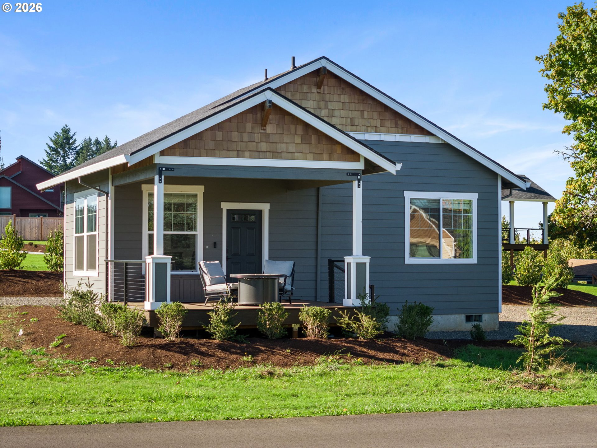 18255 Southeast Vista View Court Sandy, OR 97055 - Photo 36 of 48 a front view of a house with yard and green space