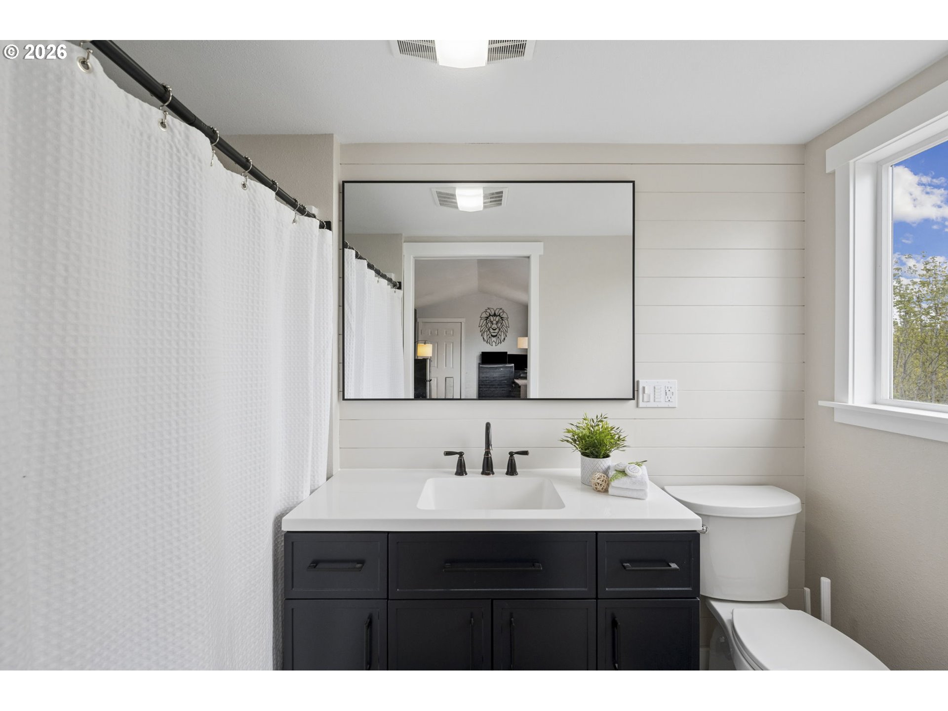 18255 Southeast Vista View Court Sandy, OR 97055 - Photo 48 of 48 a bathroom with a sink vanity and a mirror