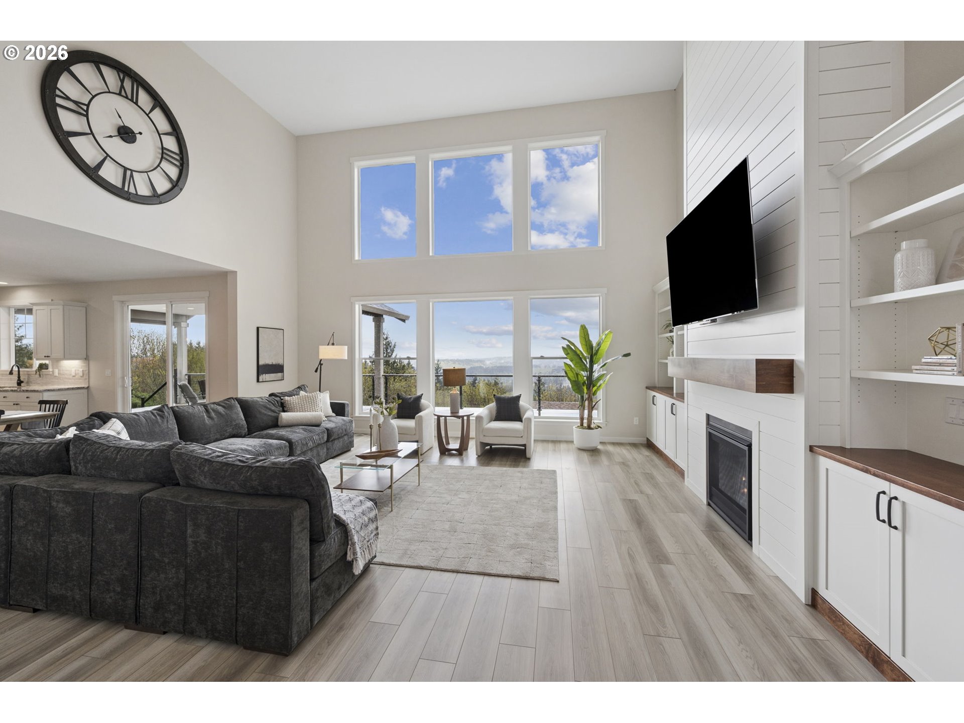 18255 Southeast Vista View Court Sandy, OR 97055 - Photo 9 of 48 a living room with fireplace furniture and a flat screen tv