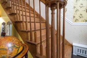 a bedroom with a bed and flat screen tv