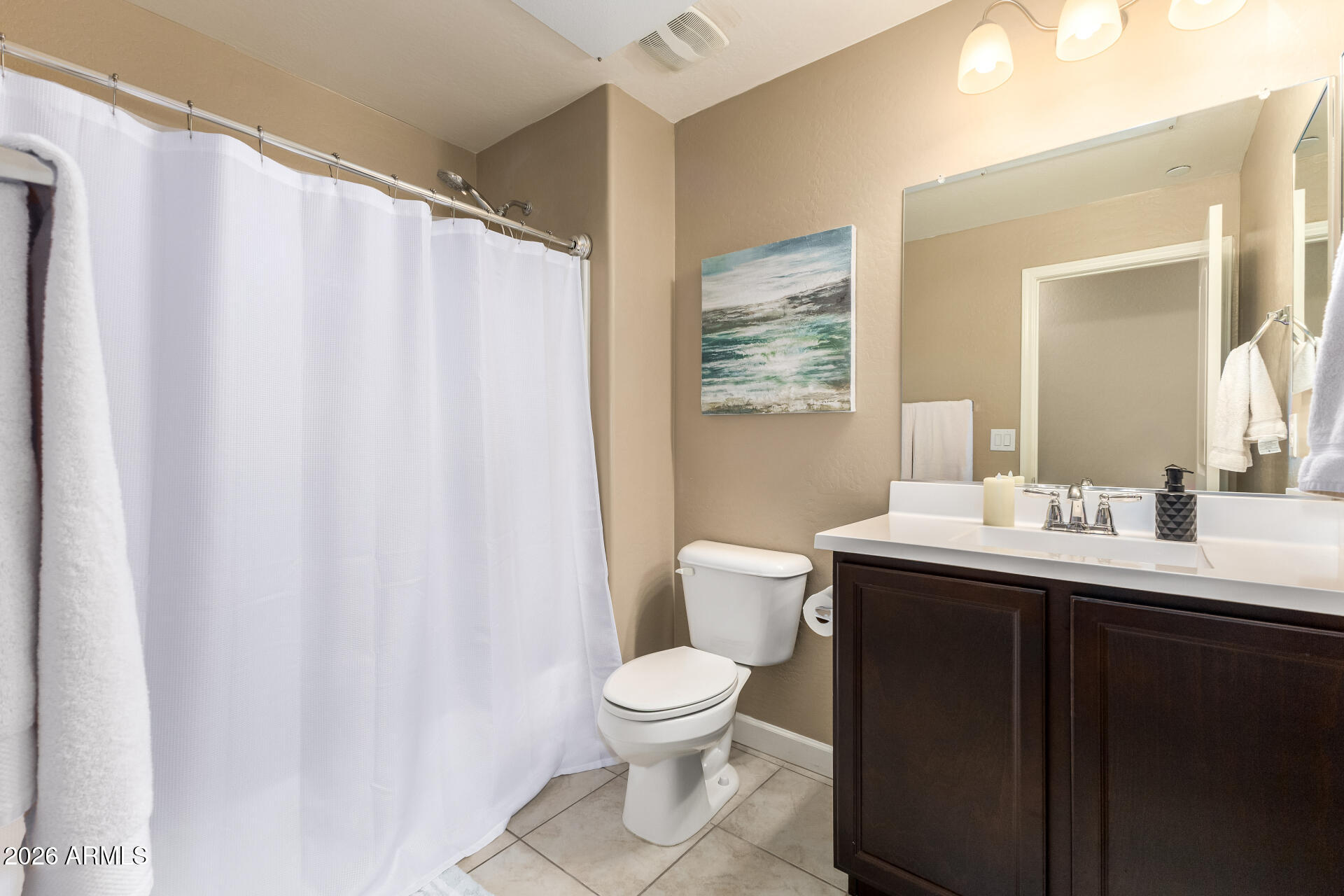 2150 West Alameda Road, Unit 1181 Phoenix, AZ 85085 - Photo 20 of 46 a bathroom with a granite countertop sink toilet and a mirror
