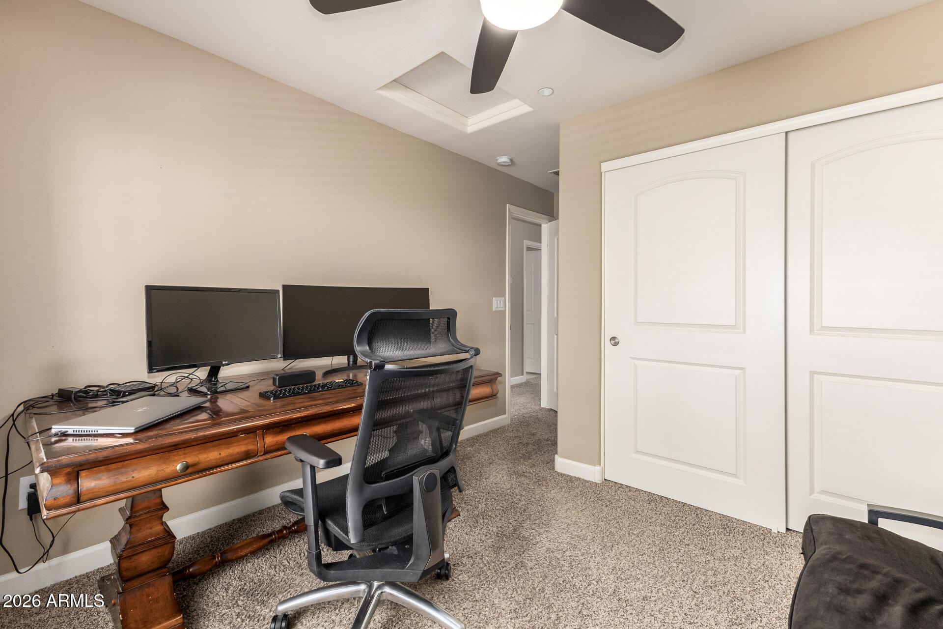 2150 West Alameda Road, Unit 1181 Phoenix, AZ 85085 - Photo 23 of 46 a workspace with furniture and a gate