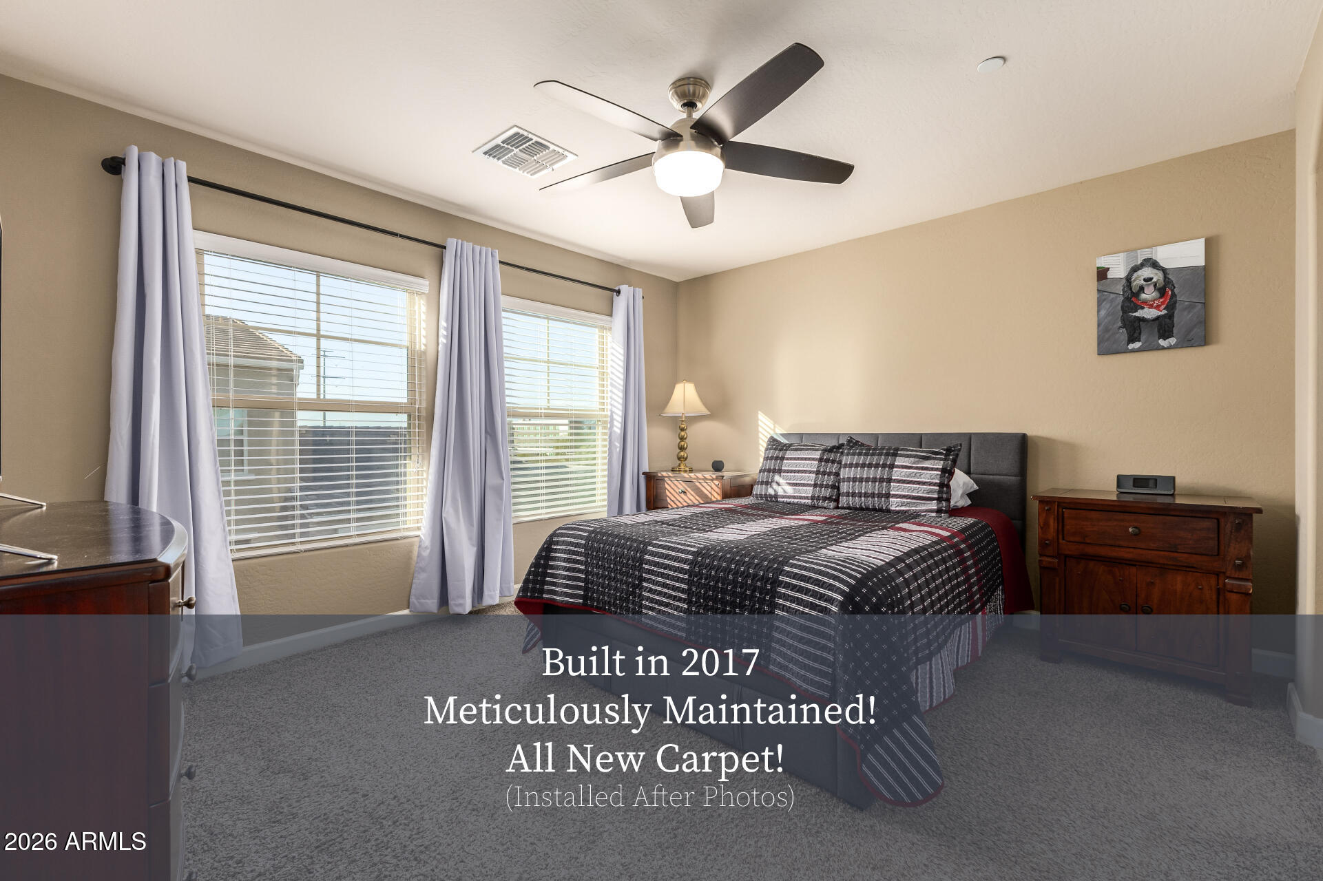 2150 West Alameda Road, Unit 1181 Phoenix, AZ 85085 - Photo 44 of 46 a bedroom with a bed and a chandelier