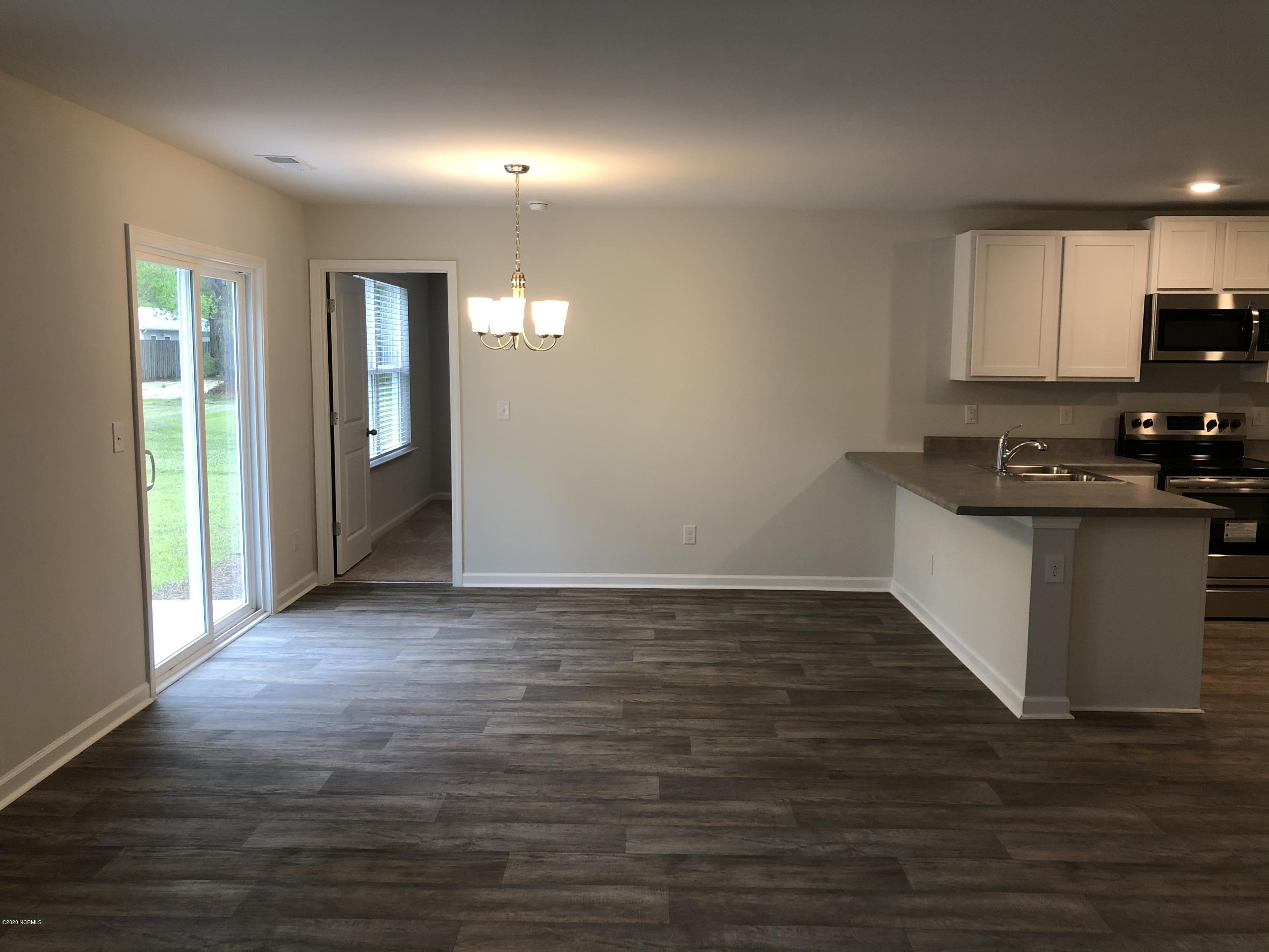 395 Ellis Road Southeast, Unit LOT #30 Bolivia, NC 28422 - Photo 7 of 41 Dining Area just off the Kitchen
