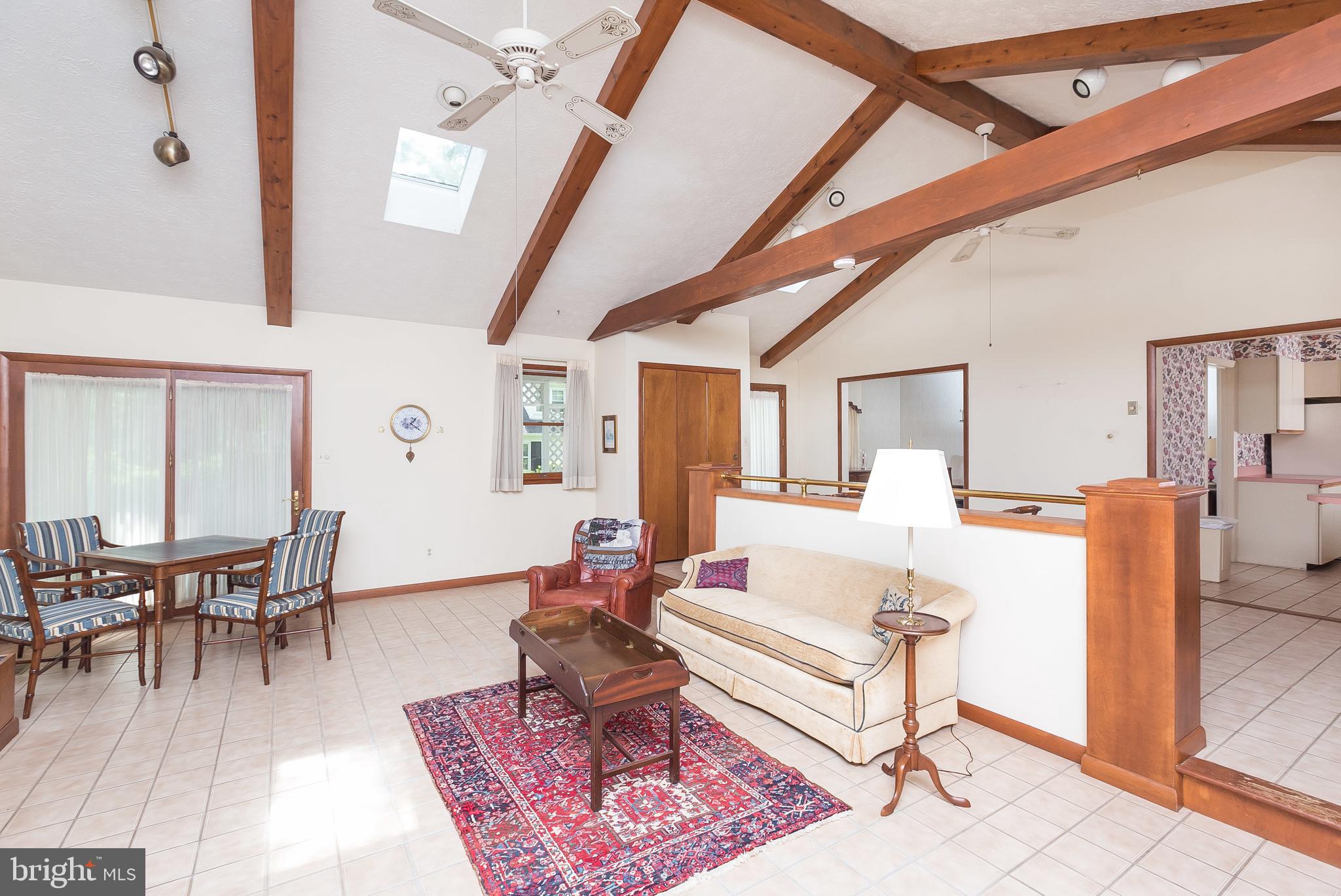 8203 Burnley Road Baltimore, MD 21204 - Photo 17 of 40 Family room - with exposed beams