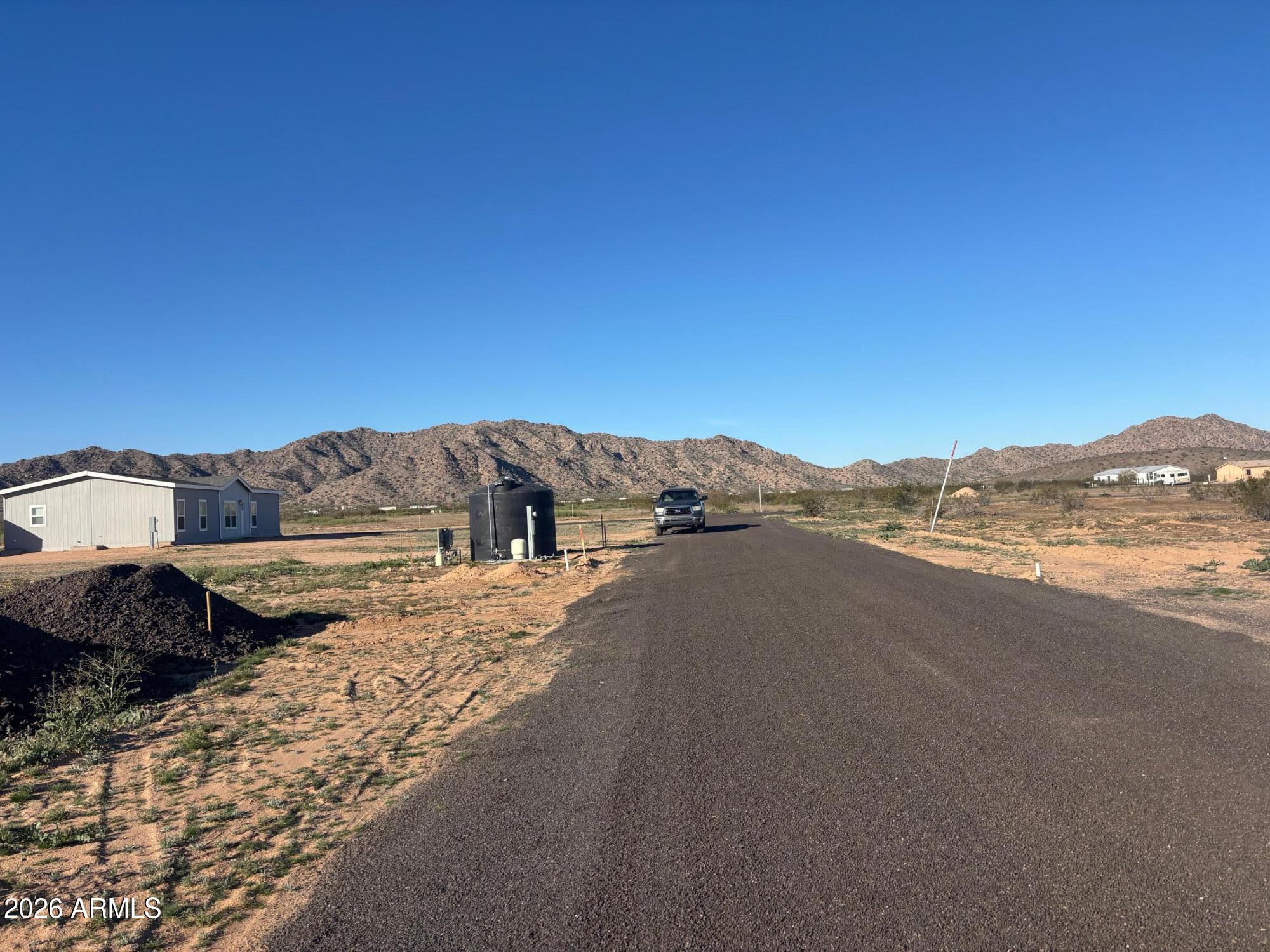 54013 West Roman Road Maricopa, AZ 85139 - Photo 4 of 4 a view of ocean and a mountain