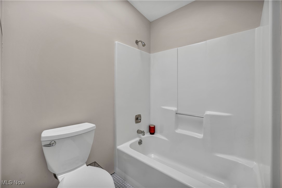 736 Hampton Ridge Drive Akron, OH 44313 - Photo 30 of 43 Full bathroom featuring shower / tub combination and tile patterned floors