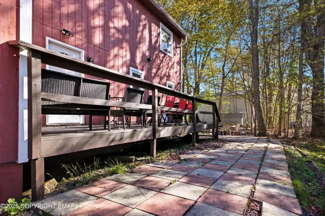 a view of a house with a small yard