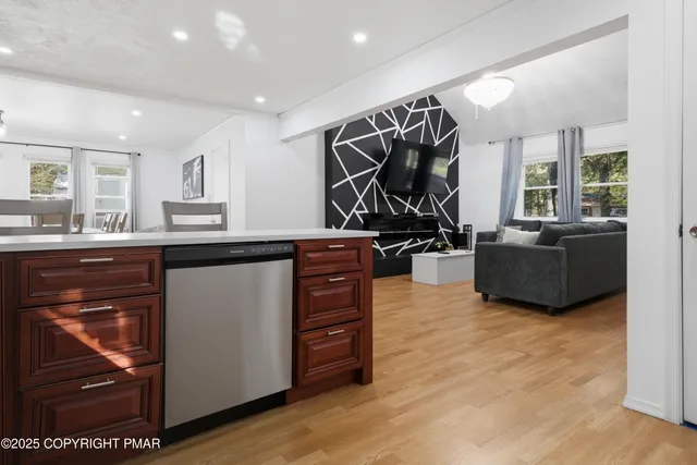 a living room with a couch and a flat screen tv