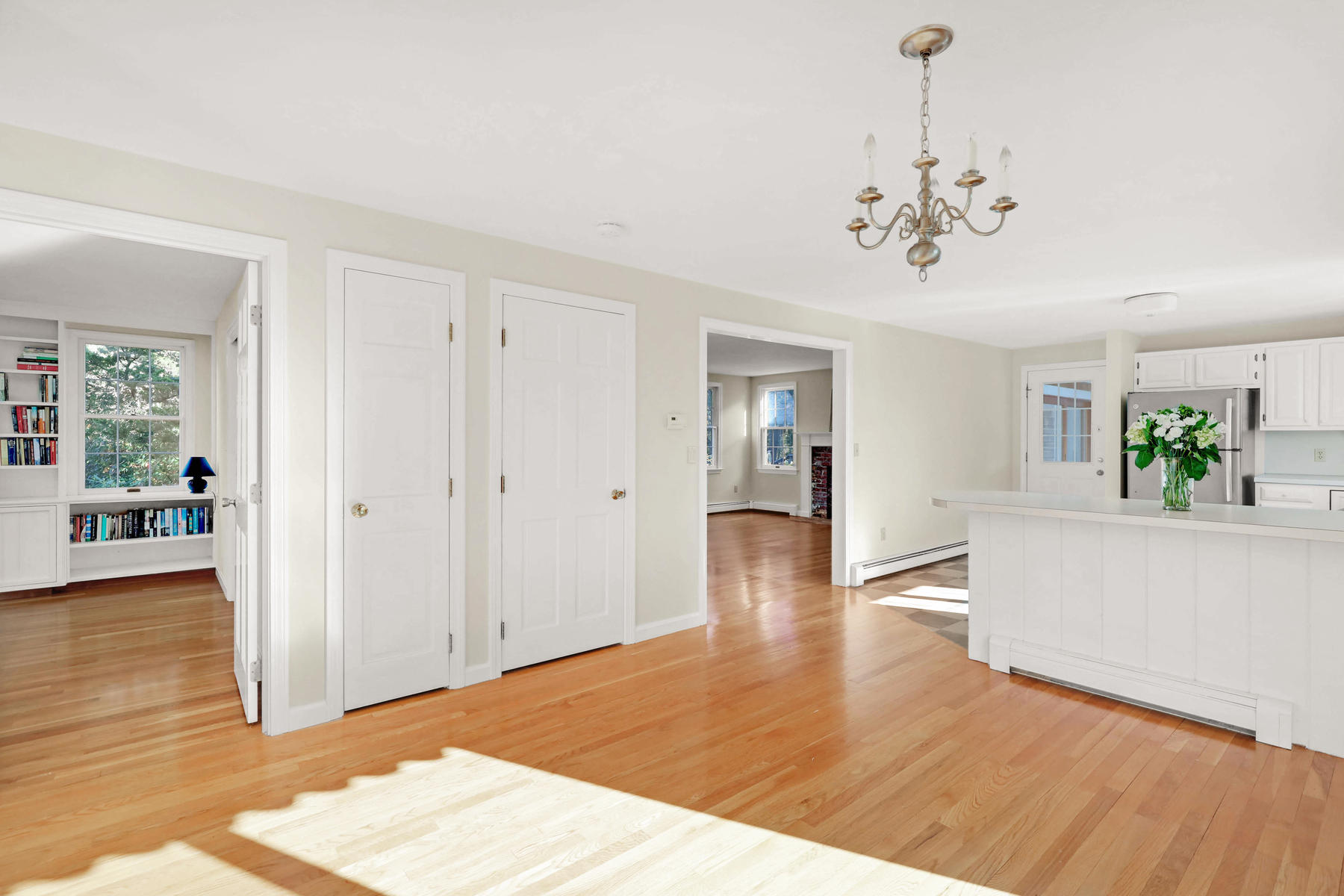 21 Briar Spring Road Orleans, MA 02653 - Photo 19 of 65 a view of a livingroom with wooden floor and furniture