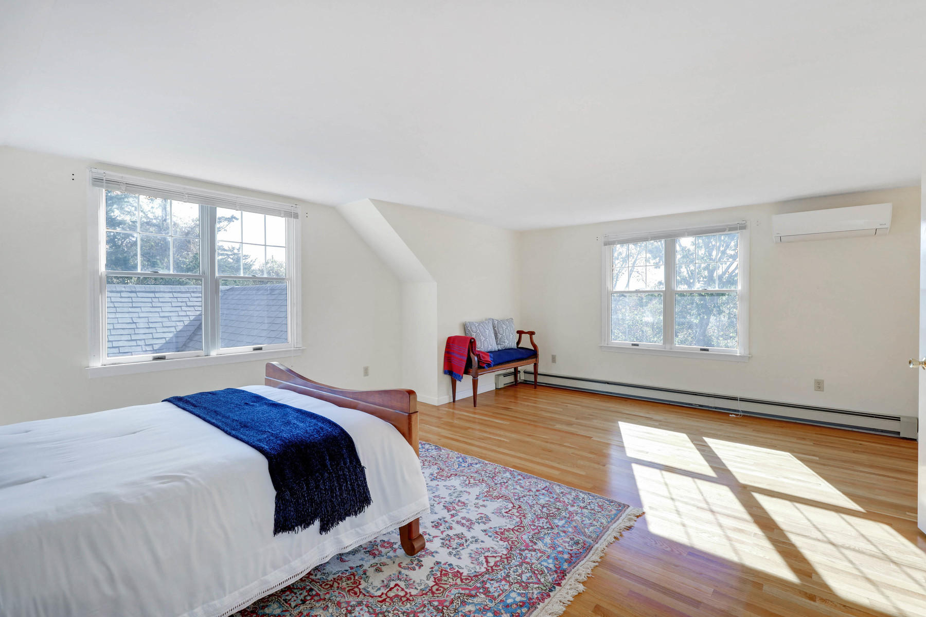 21 Briar Spring Road Orleans, MA 02653 - Photo 23 of 65 a bed room with a bed and a large window
