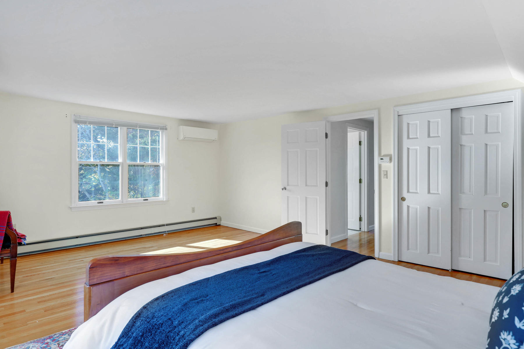 21 Briar Spring Road Orleans, MA 02653 - Photo 25 of 65 a bedroom with a bed and a window