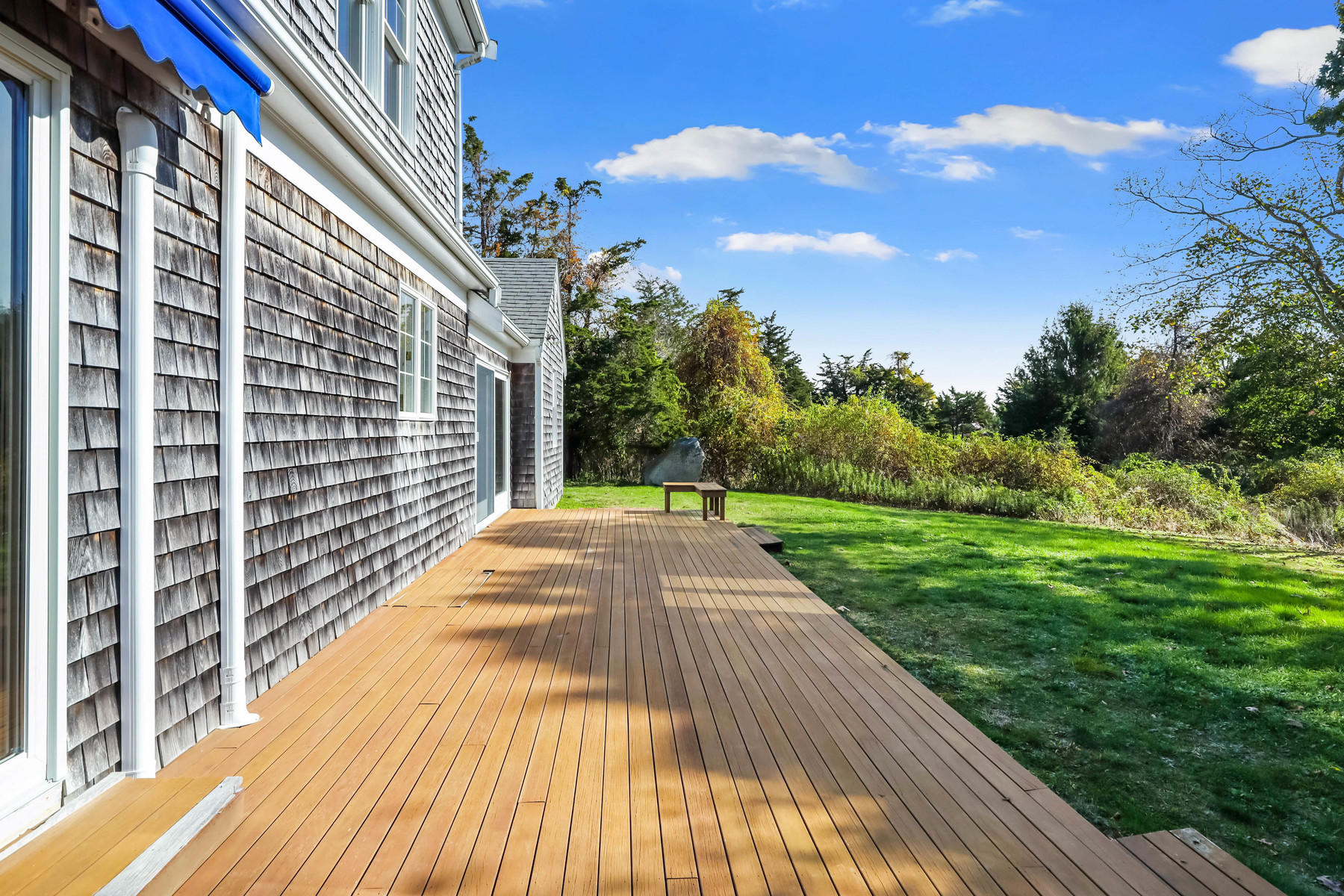 21 Briar Spring Road Orleans, MA 02653 - Photo 34 of 65 a view of a backyard with sitting area