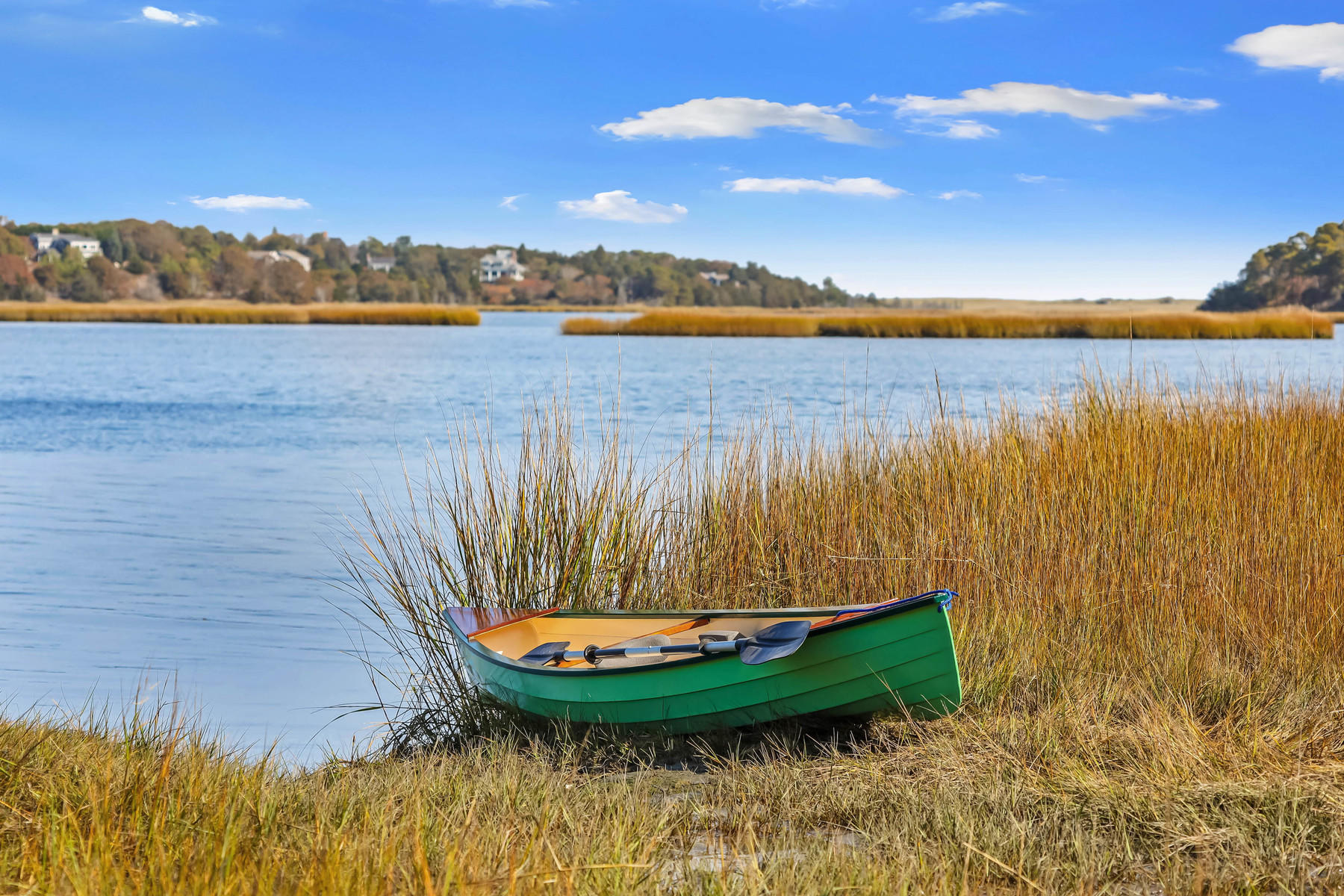 21 Briar Spring Road Orleans, MA 02653 - Photo 37 of 65 a view of a lake with a mountain in the background