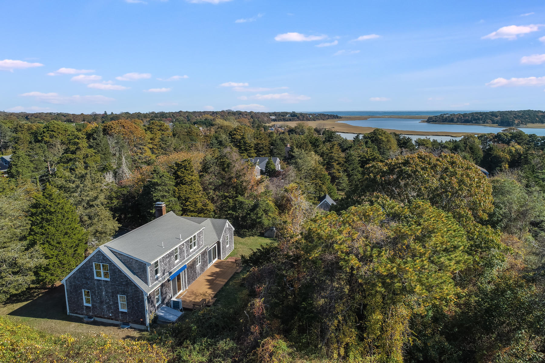 21 Briar Spring Road Orleans, MA 02653 - Photo 53 of 65 an aerial view of a house with a lake view