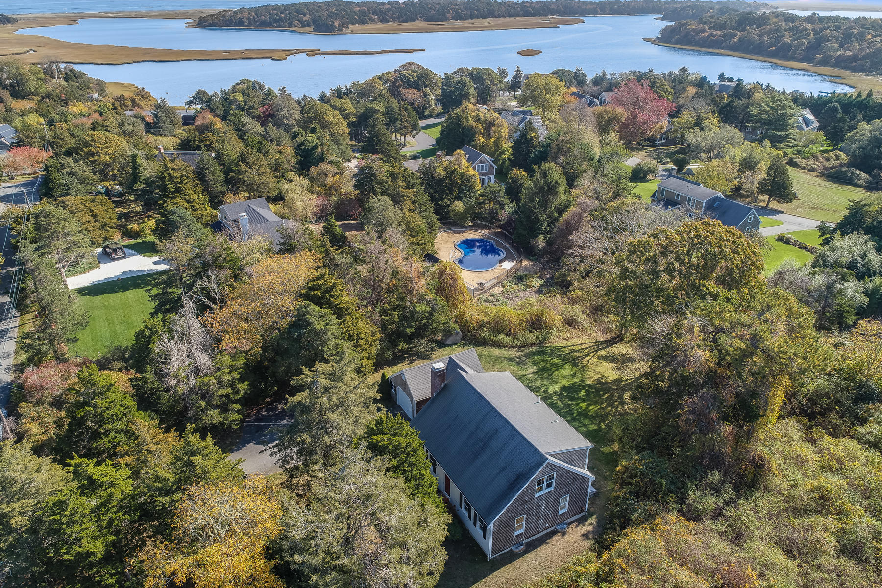 21 Briar Spring Road Orleans, MA 02653 - Photo 56 of 65 a view of a house with a yard