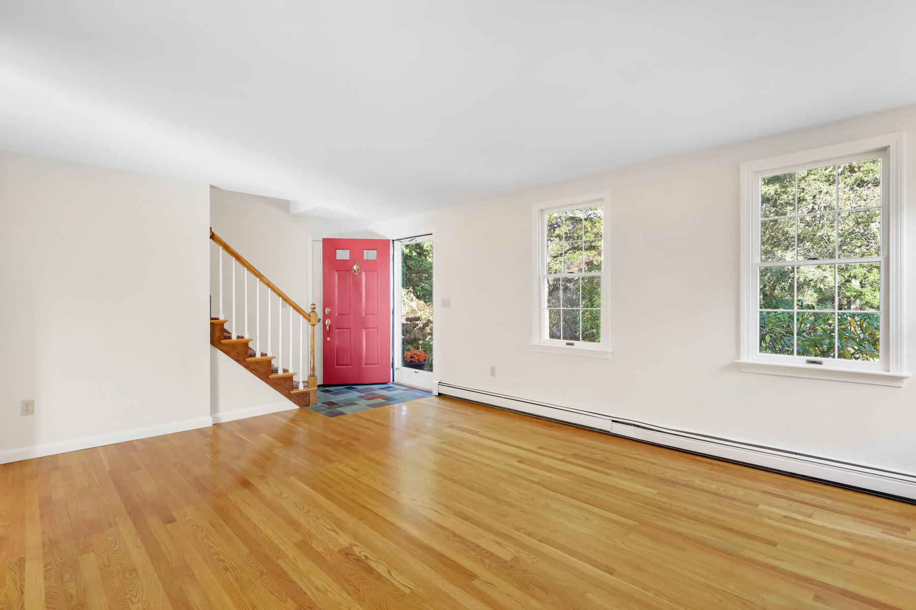 21 Briar Spring Road Orleans, MA 02653 - Photo 9 of 65 a view of an empty room with window and wooden floor