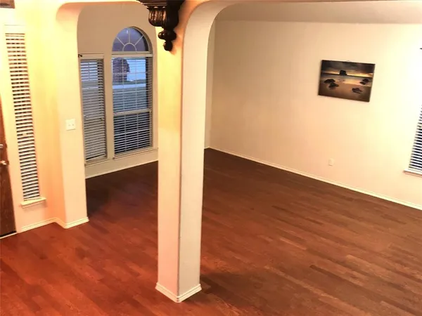 a living room with a bed