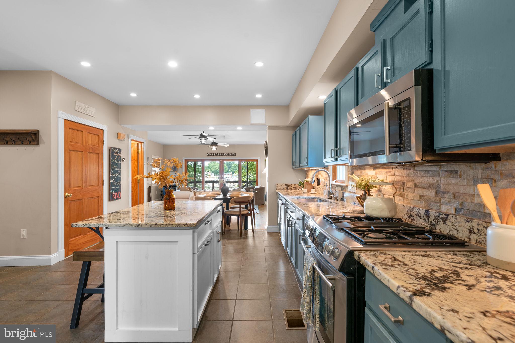 7674 Pine Knob Road Pasadena, MD 21122 - Photo 12 of 59 a kitchen with lots of counter top space