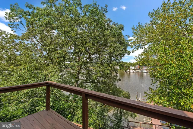 a bathroom with a bathtub sink and mirror
