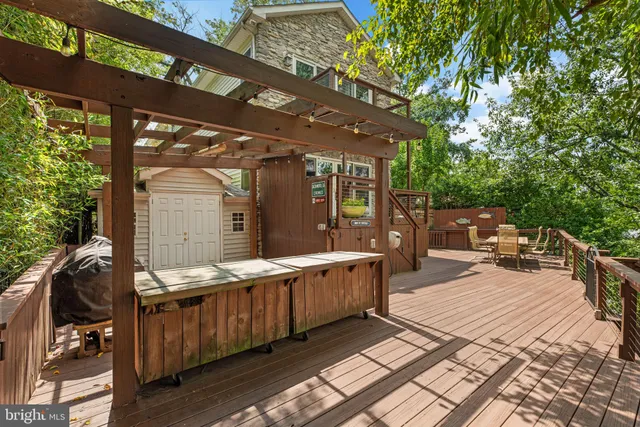 a view of a lake with sitting area