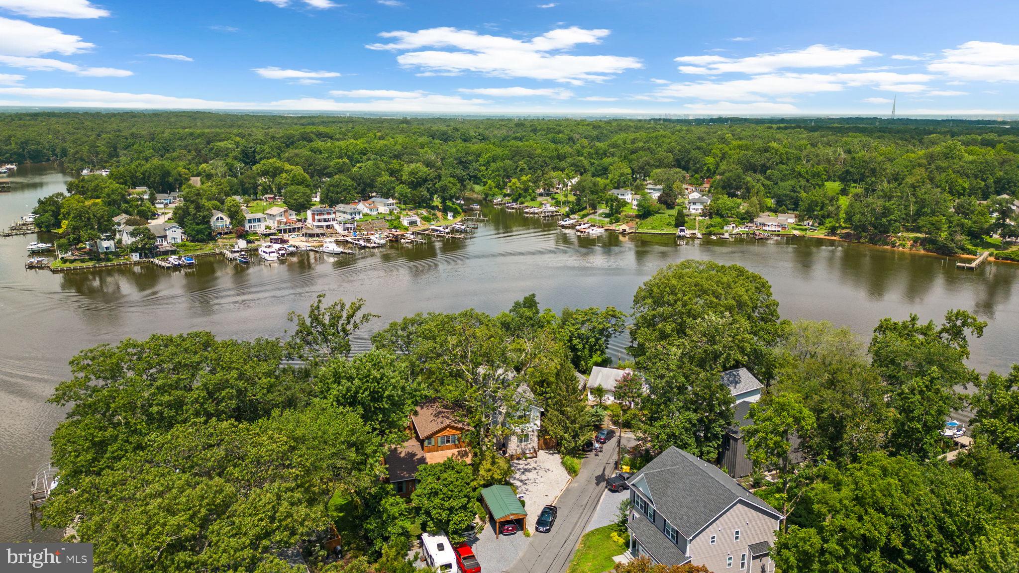 7674 Pine Knob Road Pasadena, MD 21122 - Photo 50 of 59 a view of a lake with houses