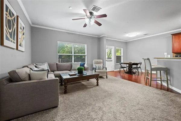 a living room with furniture and a window