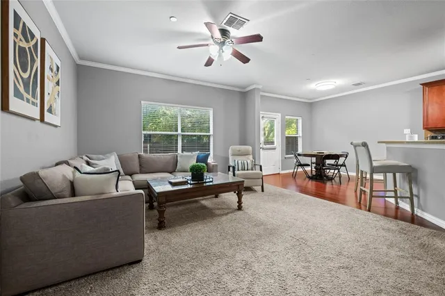 a living room with furniture and a window