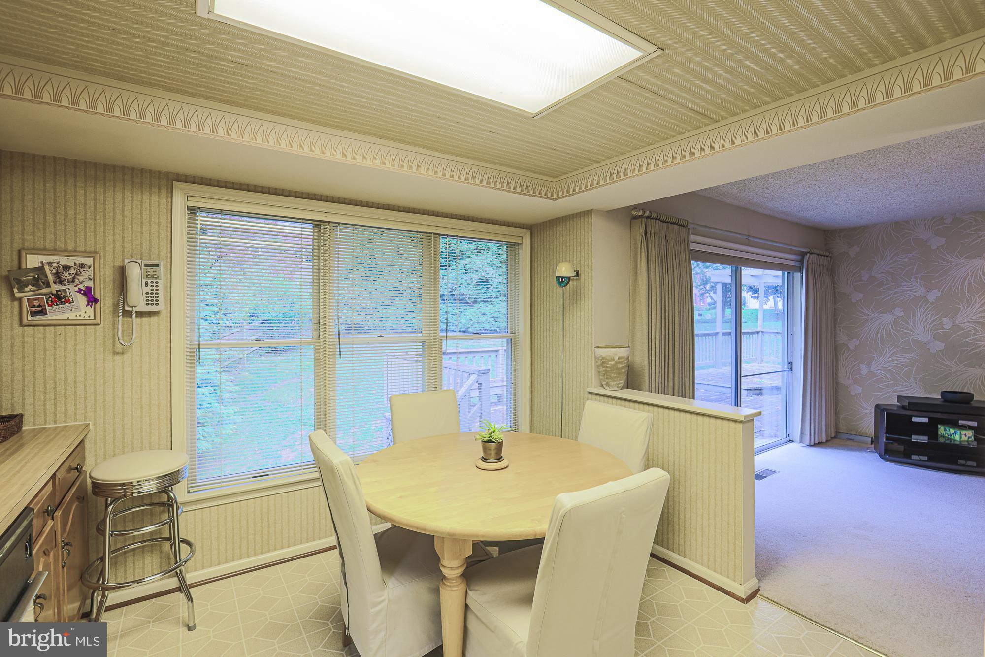 260 Hunters Ridge Road Lutherville-Timonium, MD 21093 - Photo 14 of 48 a dining room with furniture and window