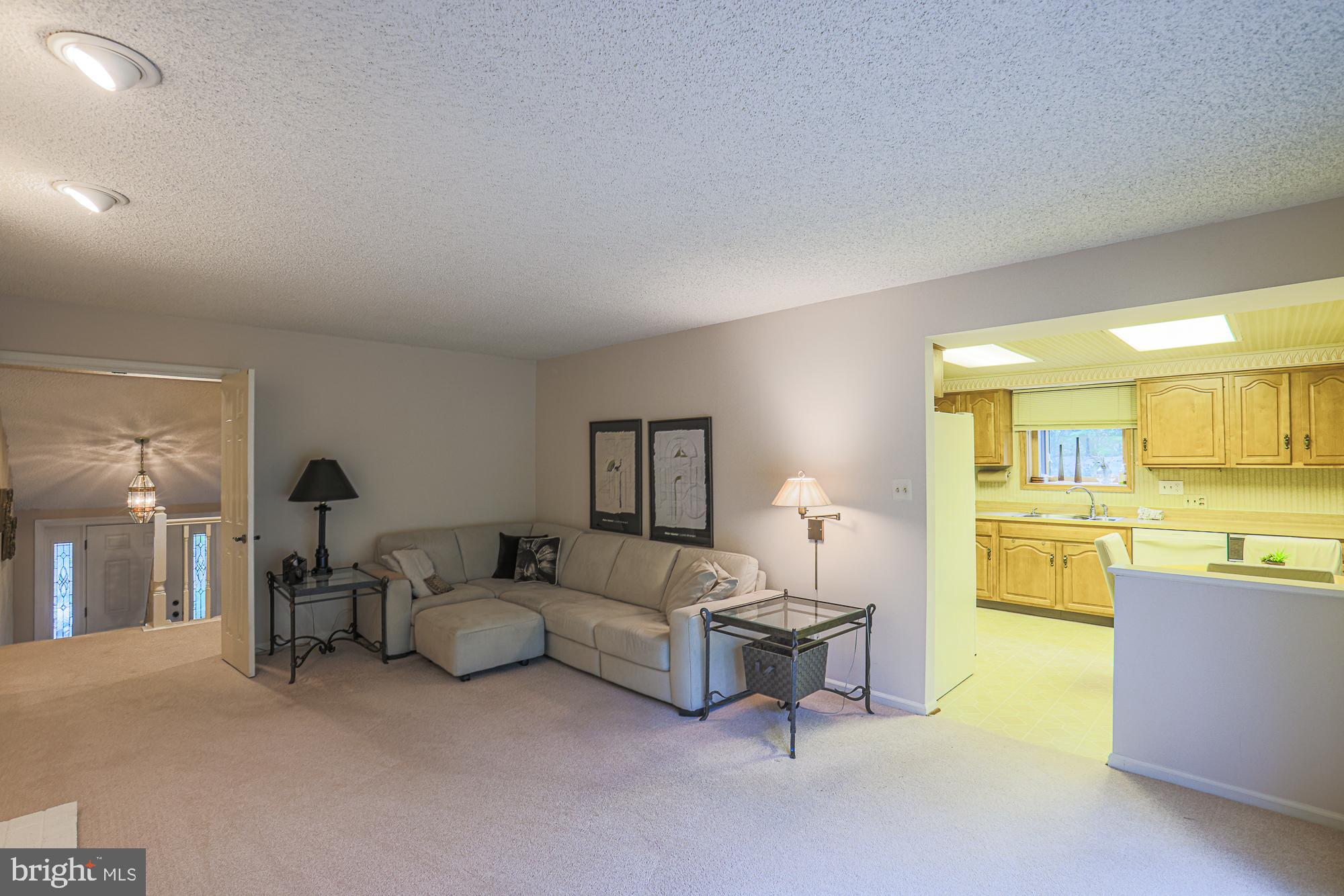260 Hunters Ridge Road Lutherville-Timonium, MD 21093 - Photo 20 of 48 a living room with furniture and a table