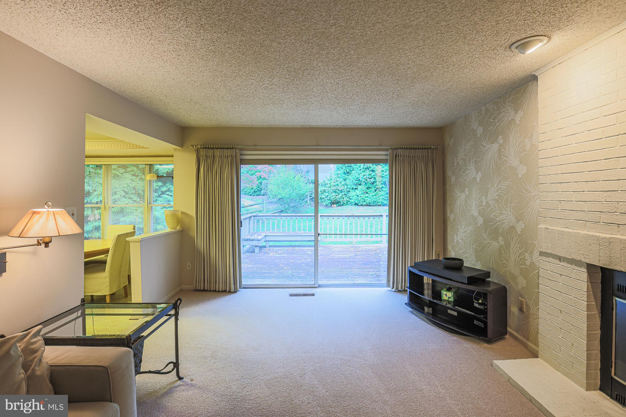 260 Hunters Ridge Road Lutherville-Timonium, MD 21093 - Photo 21 of 48 a living room with furniture and a window