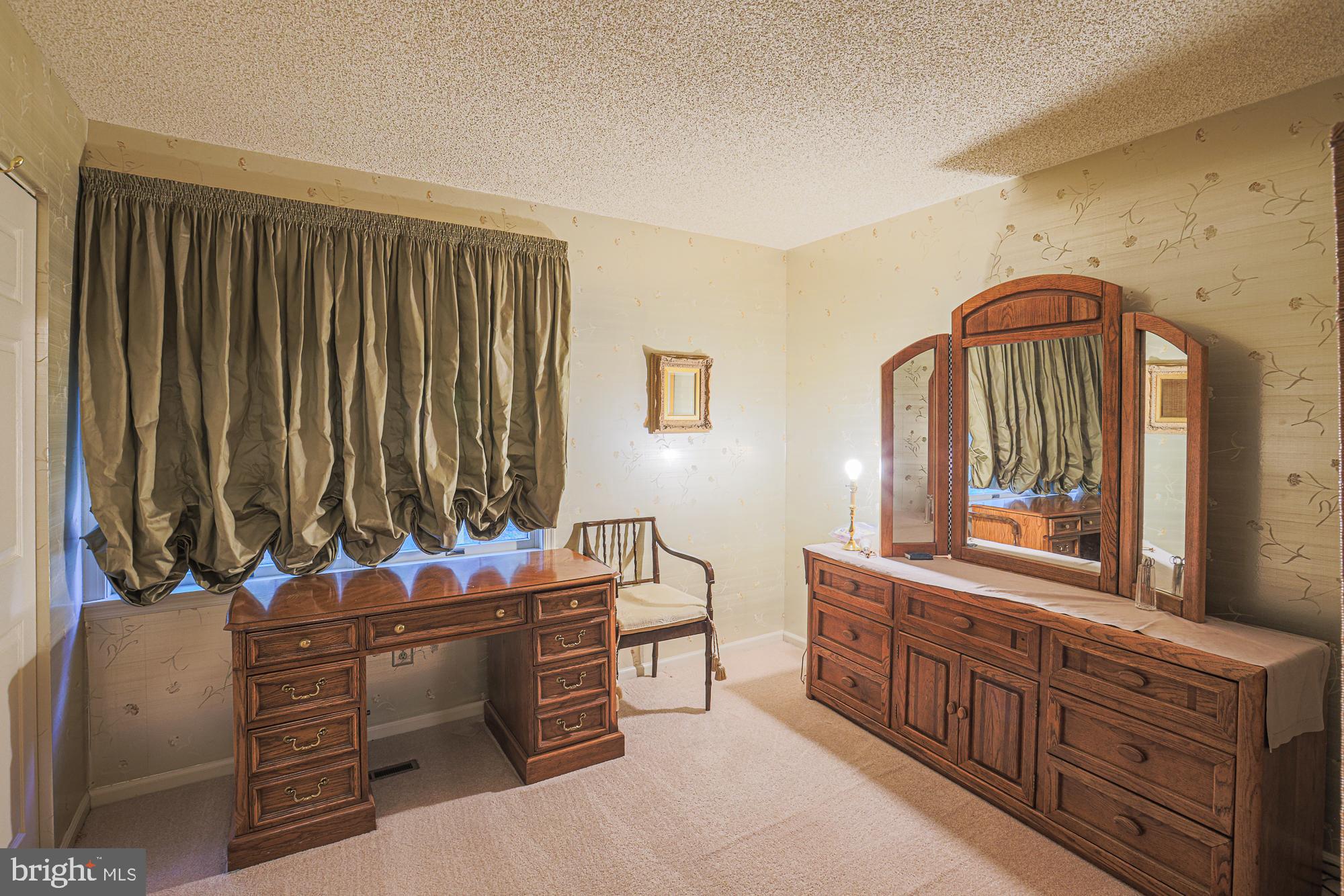 260 Hunters Ridge Road Lutherville-Timonium, MD 21093 - Photo 34 of 48 a room with lots of wooden furniture