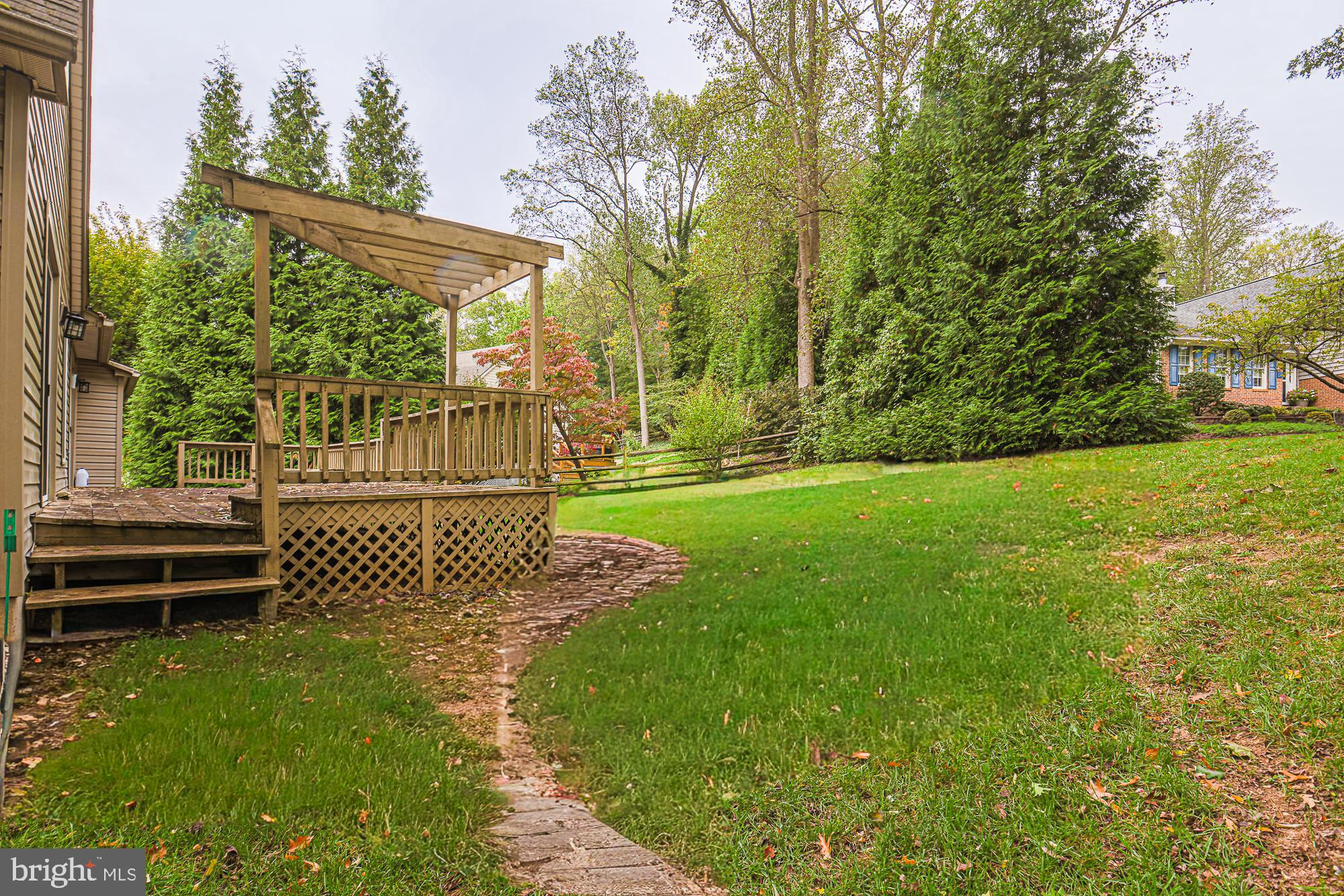 260 Hunters Ridge Road Lutherville-Timonium, MD 21093 - Photo 48 of 48 a view of a bench in the garden