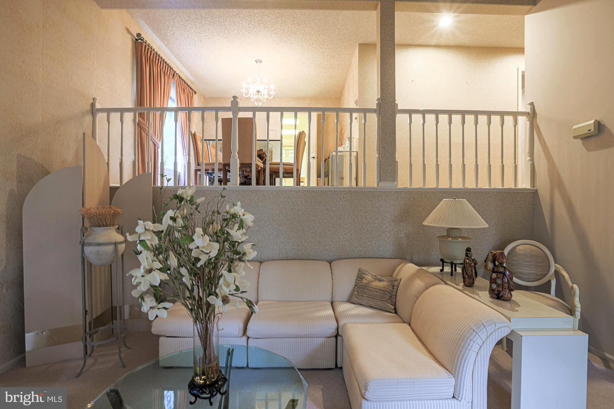 260 Hunters Ridge Road Lutherville-Timonium, MD 21093 - Photo 9 of 48 a living room with furniture and a window