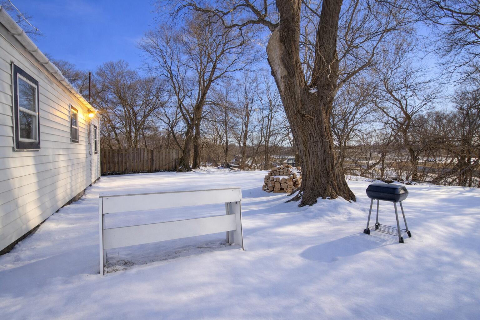 5617 East 13th Place Gary, IN 46403 - Photo 3 of 12 a view of backyard with a table and chairs
