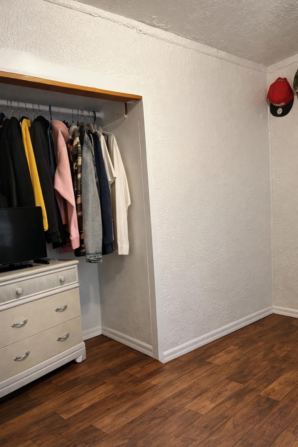 5617 East 13th Place Gary, IN 46403 - Photo 9 of 12 a view of walk in closet with clothes and shoes
