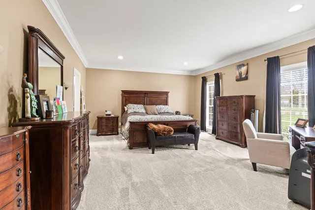 a bedroom with furniture and a fireplace