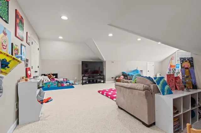 a view of a hallway with white walls