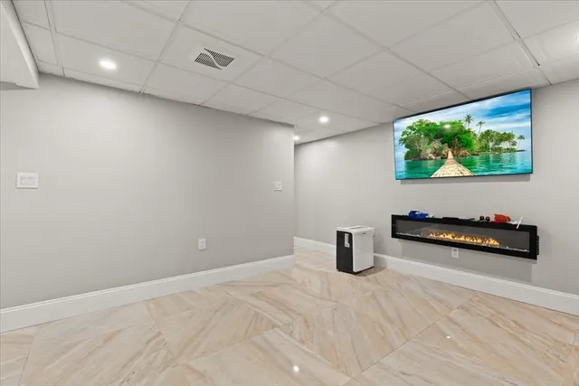 a room with furniture and wooden floor