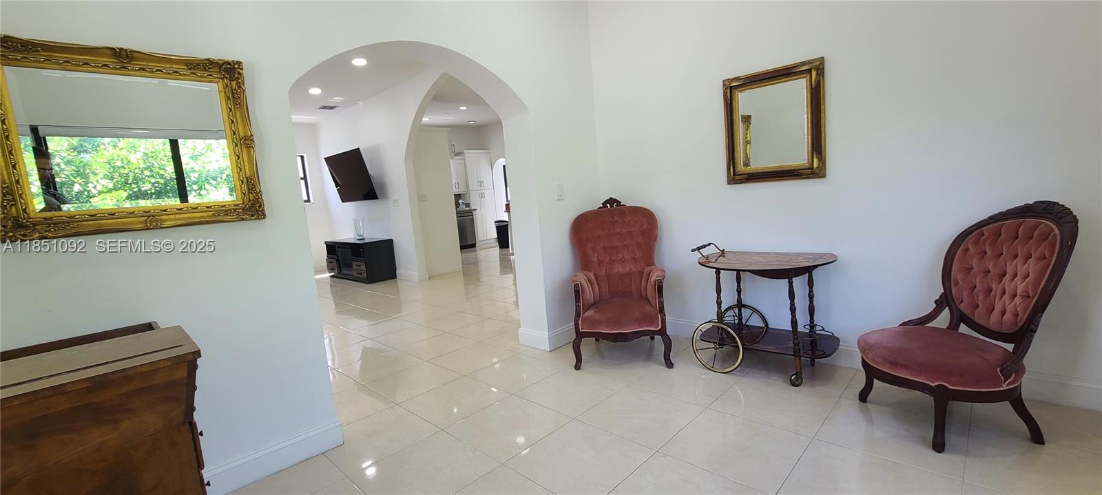1721 Southwest 24th Terrace Miami, FL 33145 - Photo 12 of 80 a view of a livingroom with furniture and a chair