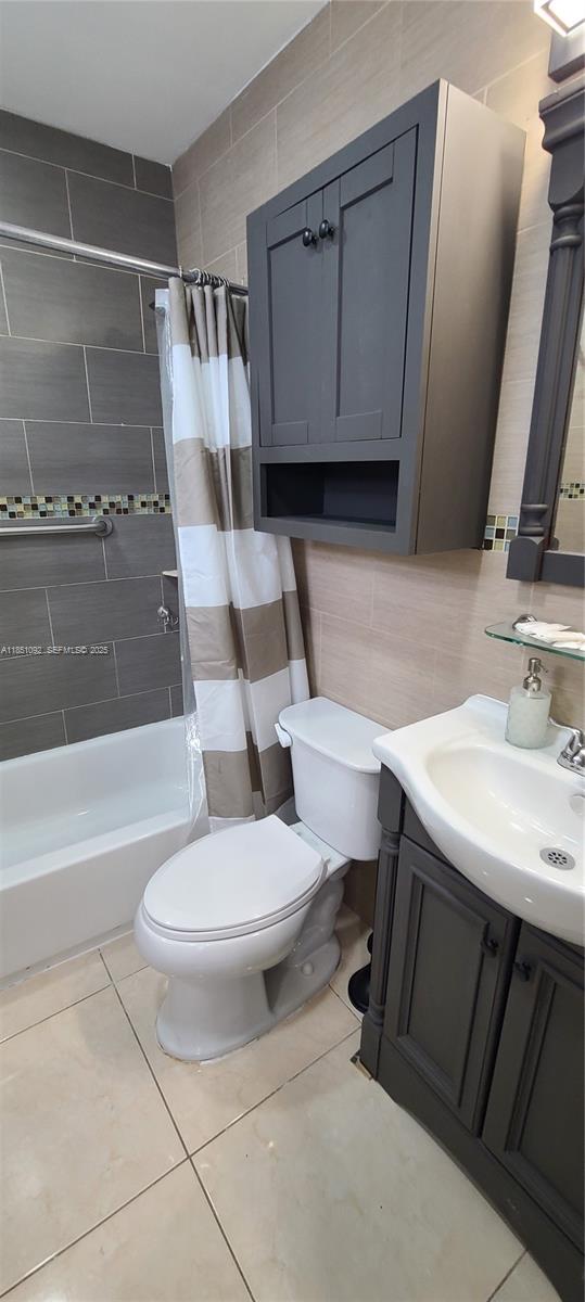 1721 Southwest 24th Terrace Miami, FL 33145 - Photo 45 of 80 a bathroom with a sink toilet and shower