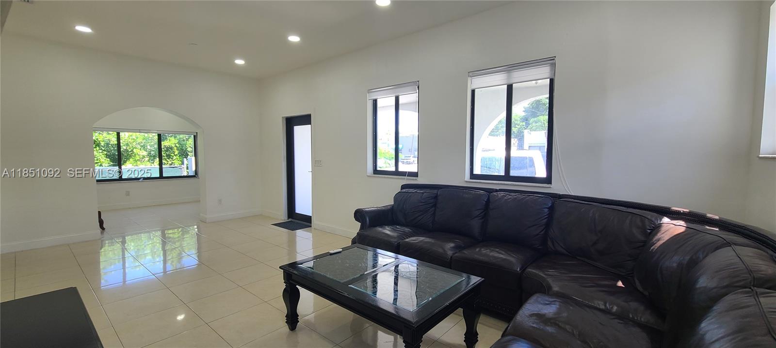 1721 Southwest 24th Terrace Miami, FL 33145 - Photo 7 of 80 a living room with furniture and a window