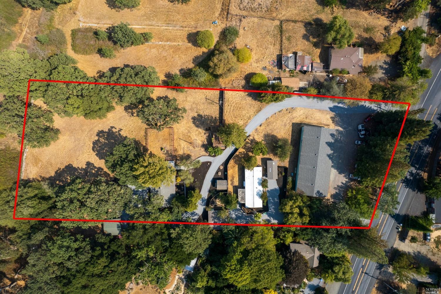 This very special multi unit property can be your family compound as well as the location for your business.  SO many uses and possibilities with this property with 3 dwellings, large warehouse and room to roam.