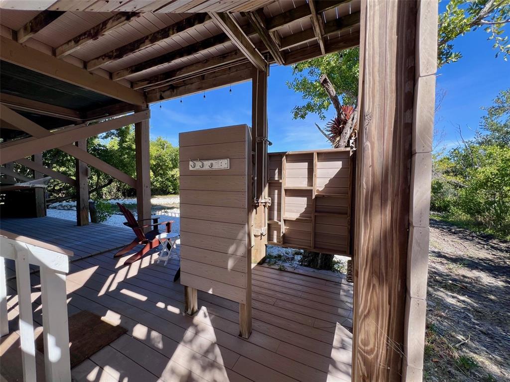 9568 Buccaneer Trail Boca Grande, FL 33921 - Photo 11 of 49 a view of balcony with wooden floor