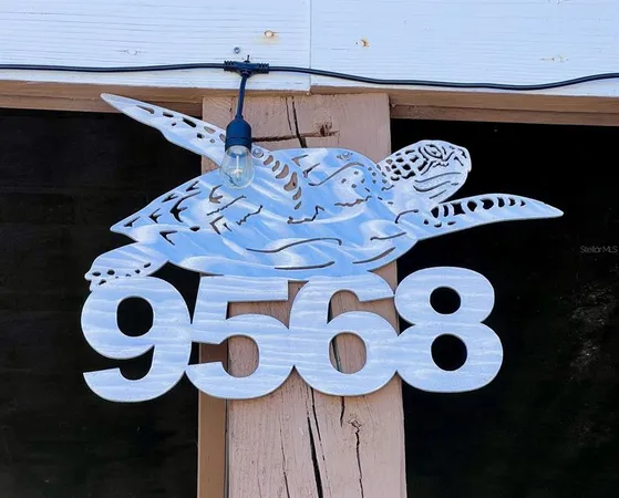 a kitchen with a stove a sink and a refrigerator