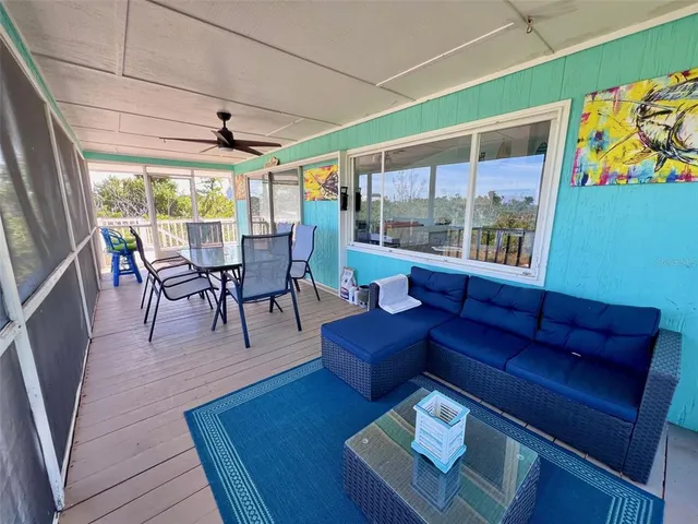 a view of kitchen and dining room with wooden floor