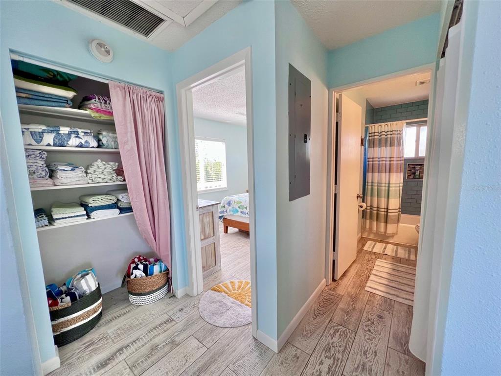 9568 Buccaneer Trail Boca Grande, FL 33921 - Photo 33 of 49 a hallway with wooden floor